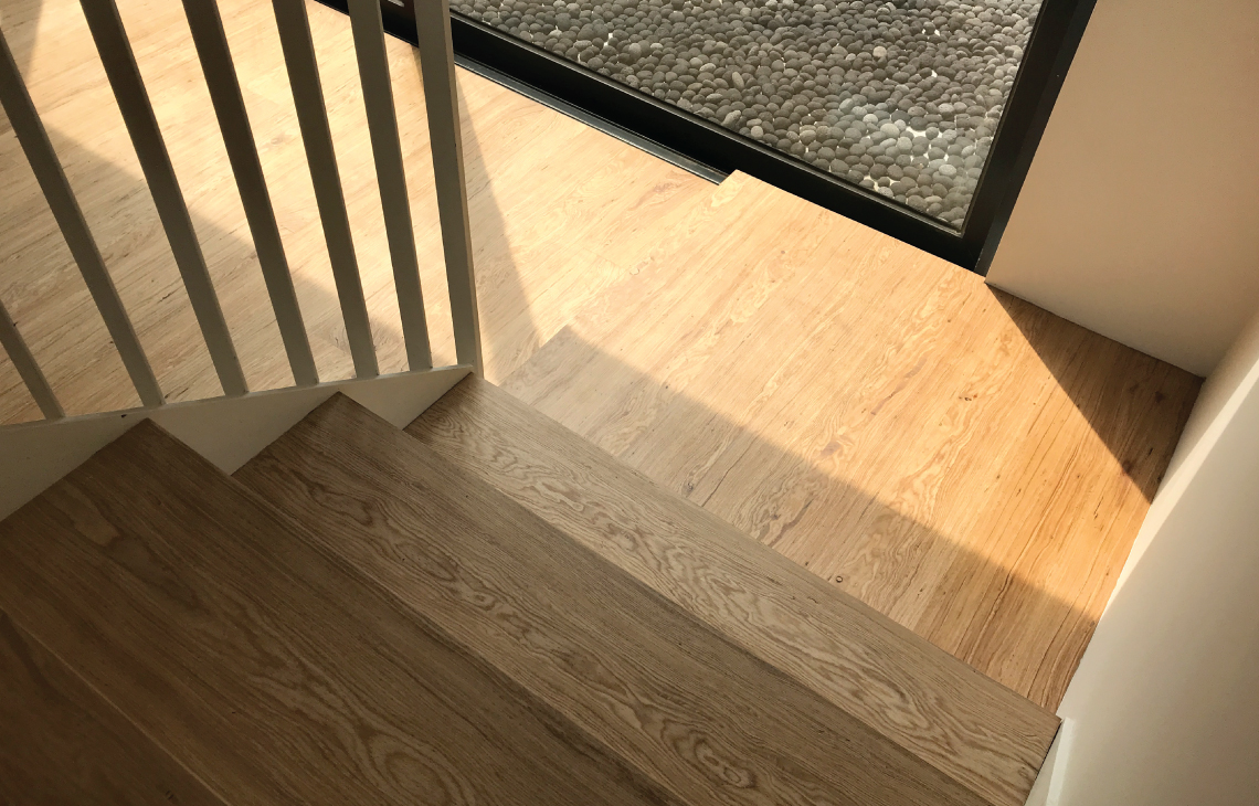 Onewood Solid Timber Interior Flooring with Staircase Landing and Tread in Bungalow
