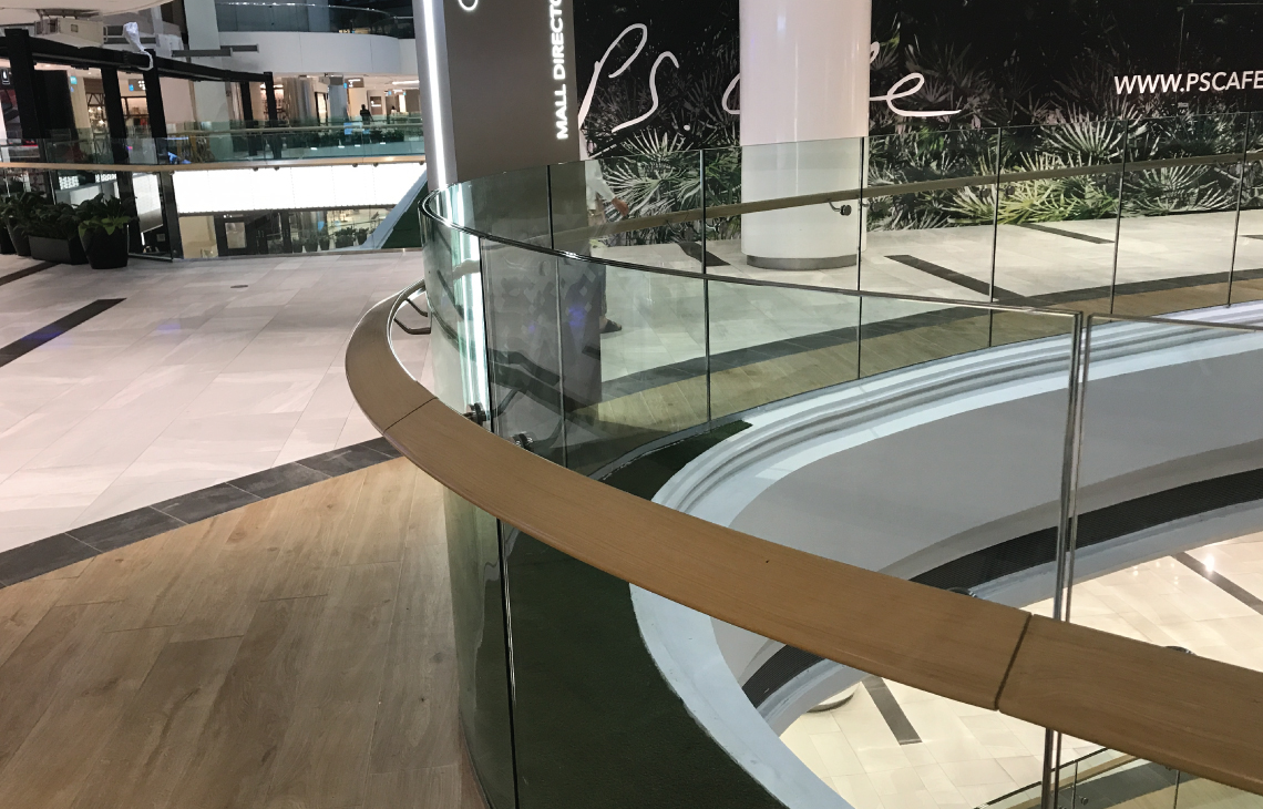Onewood Curved Timber Handrail at Shopping Centre