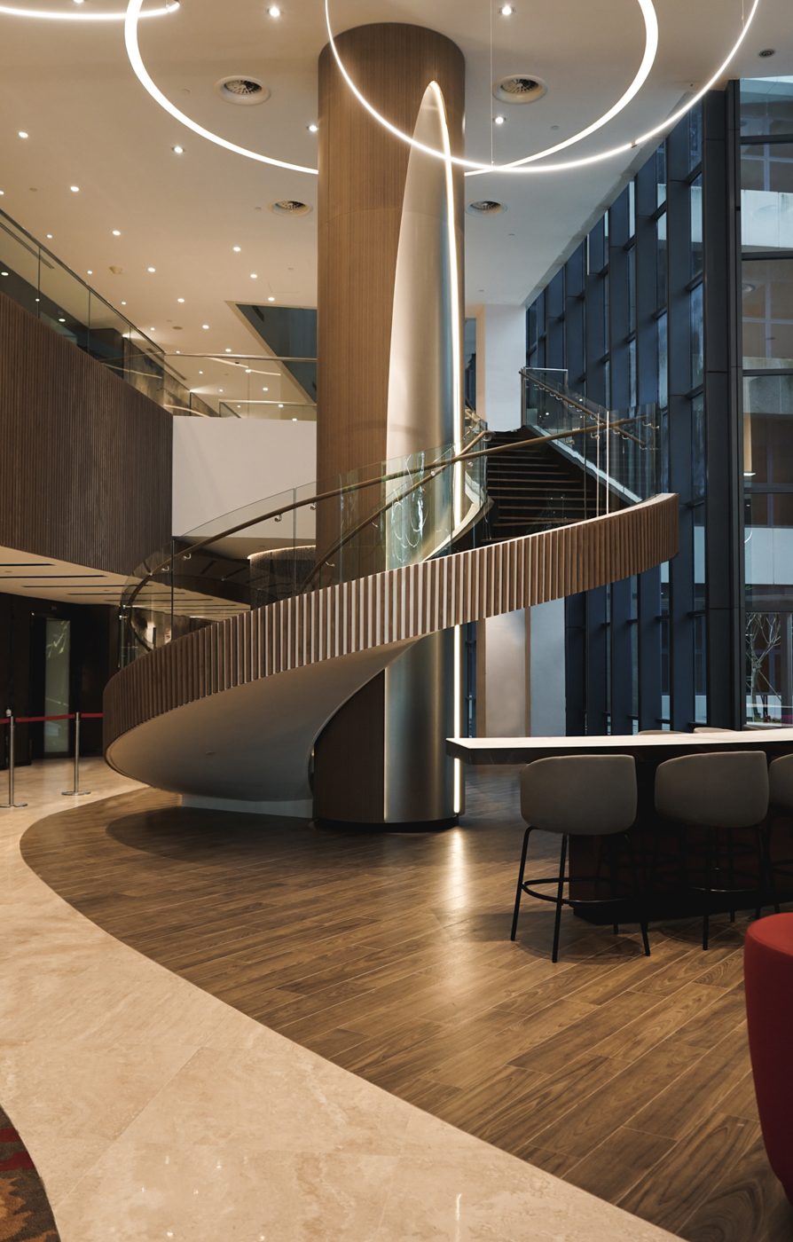 Onewood Spiral Staircase Tread and Curved Handrail